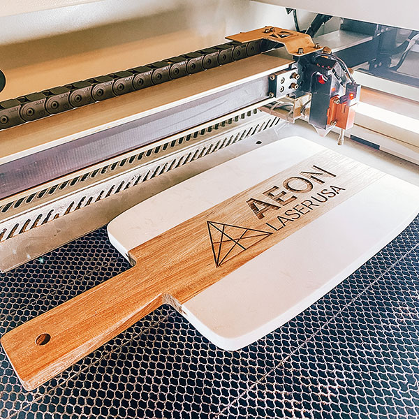 Custom wood and marble cutting board with zzijzzij亚洲日本少妇jizjiz logo engraved on it